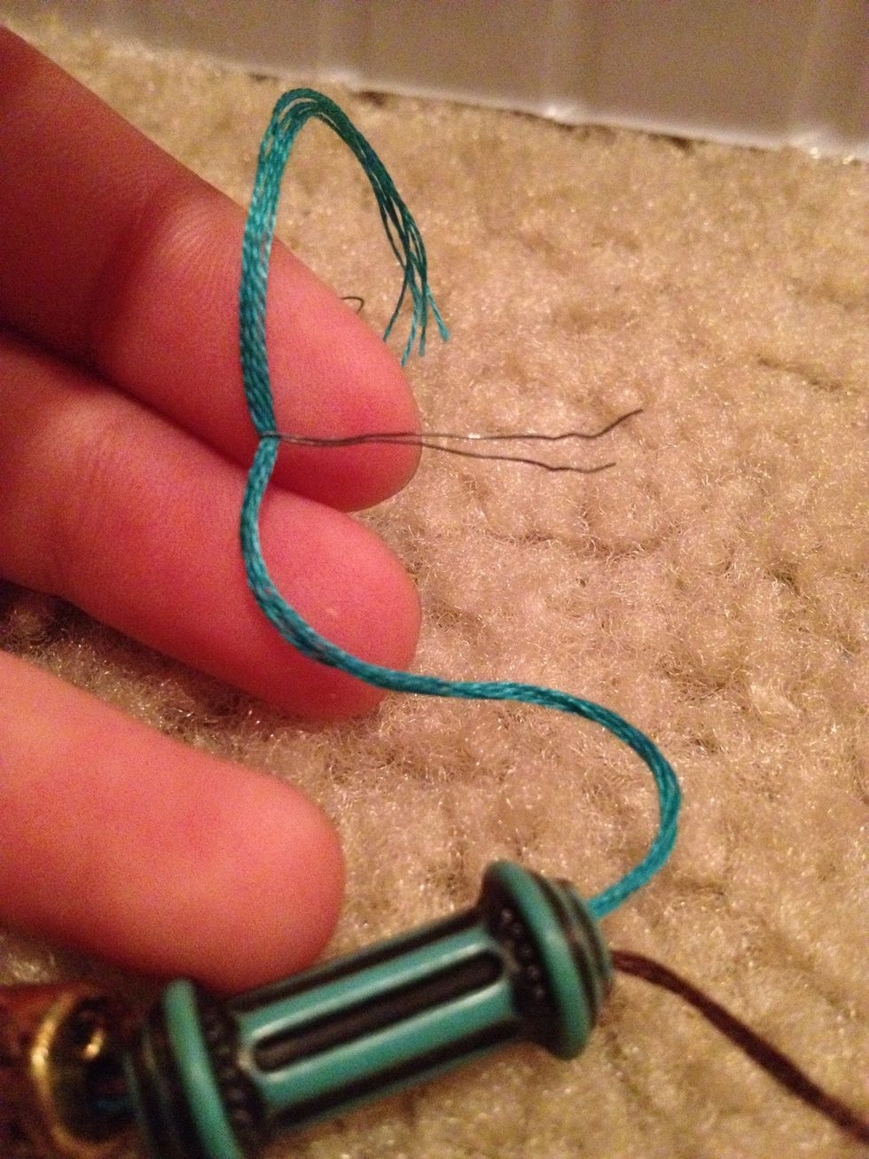 Fold over string(s). And use this story lol. The birds 'beak'(wire) bites the 'worm' (string) and goes through the 'tree' (bead).