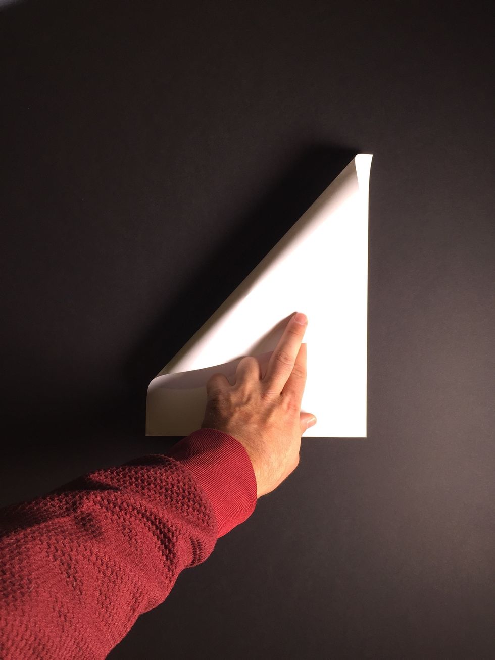 Fold over the left-hand corner as shown.