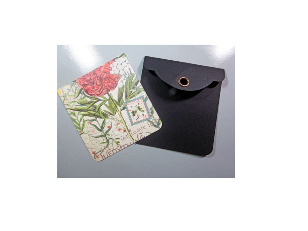 Fold over the score line and then attach some of the decorative paper from The Time to Flourish collection on the front of the pocket.