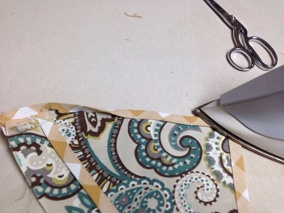 Fold over to front side and press. Top Stitch.