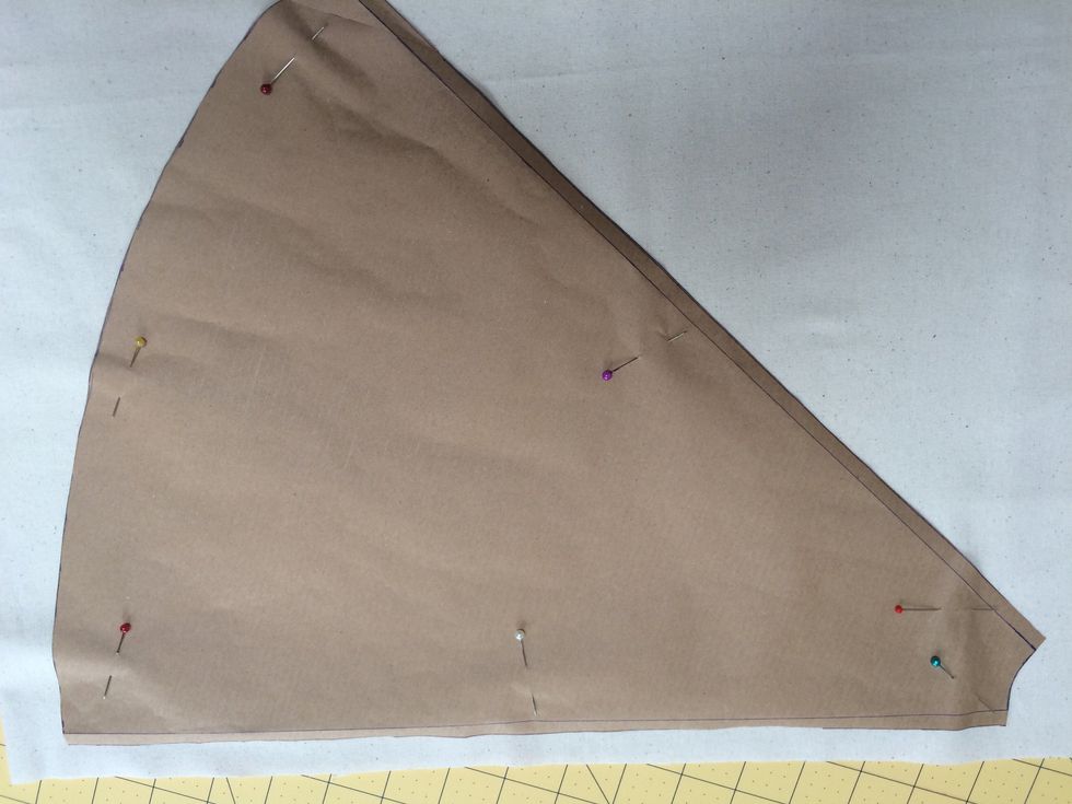 Fold paper template in half and half again to give a segment template . Cut 2 of each of the 4 fabrics adding .25 inch seam allowance