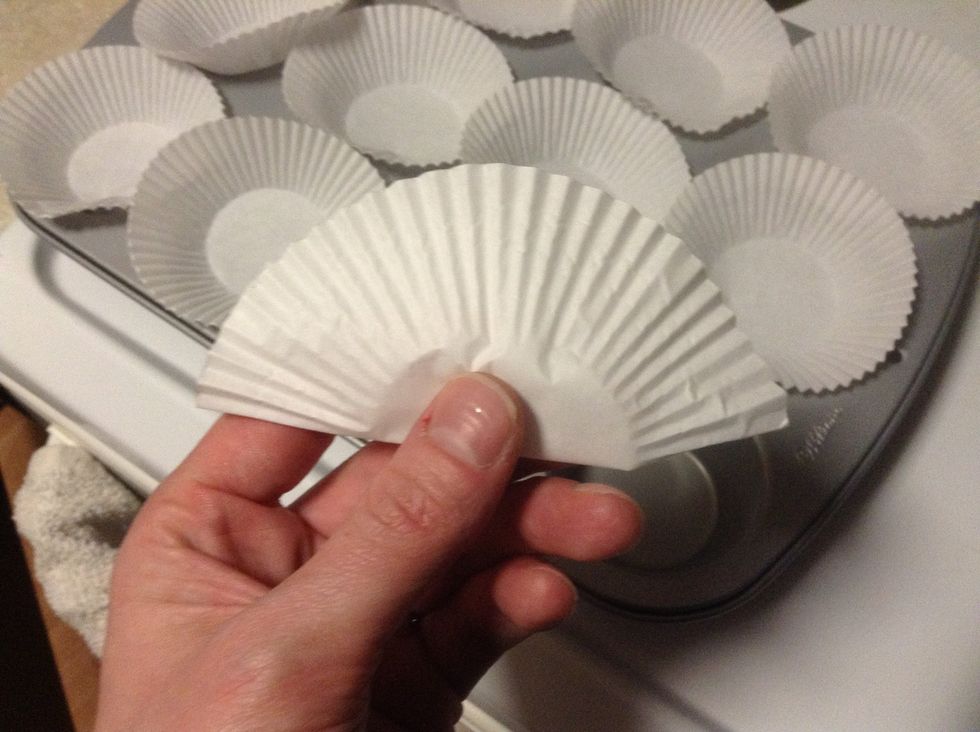 Fold papers in half to cut off half the paper