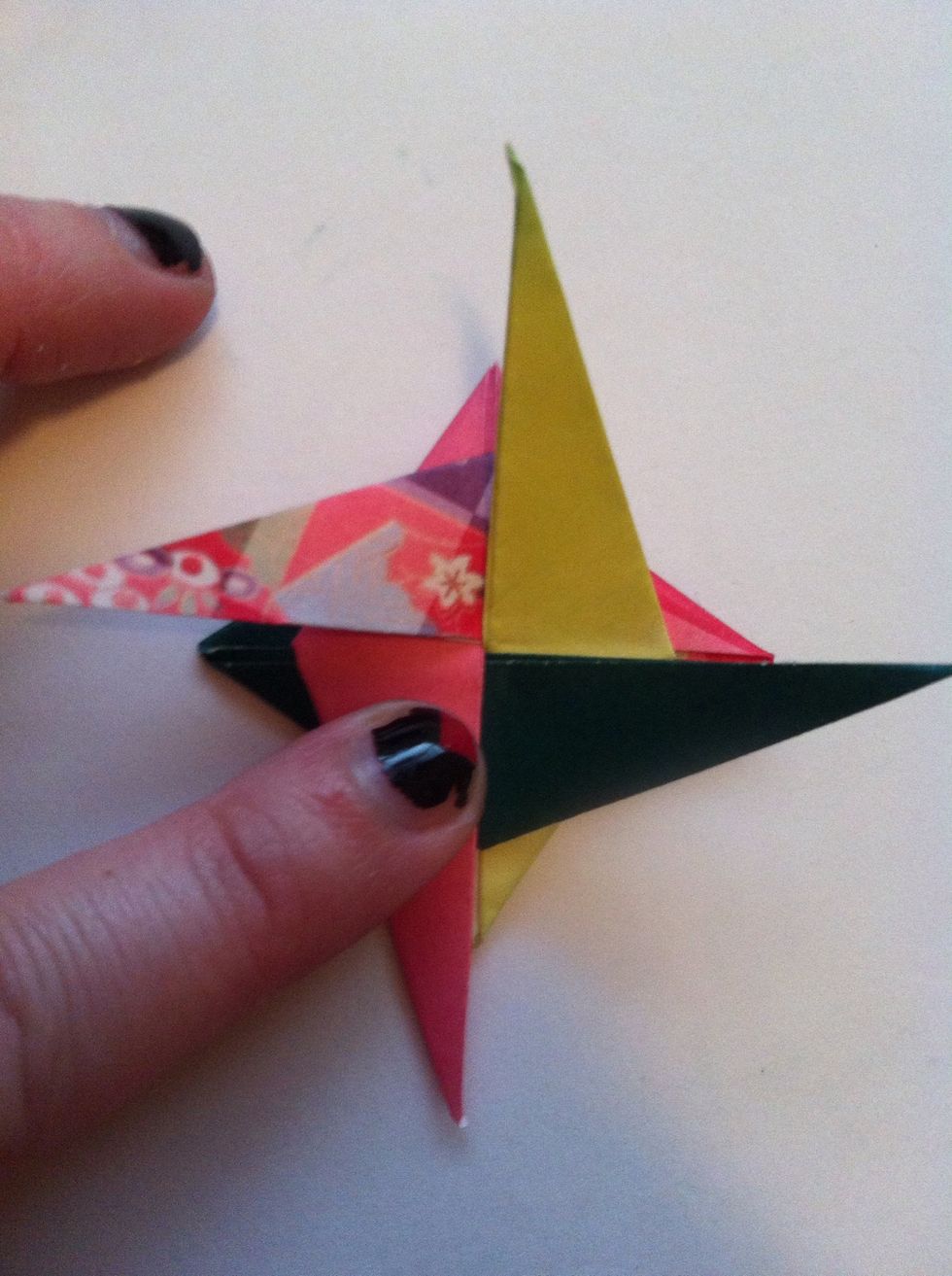 Fold patterned over to left (under green/yellow). You'll need to glue these guys down now.