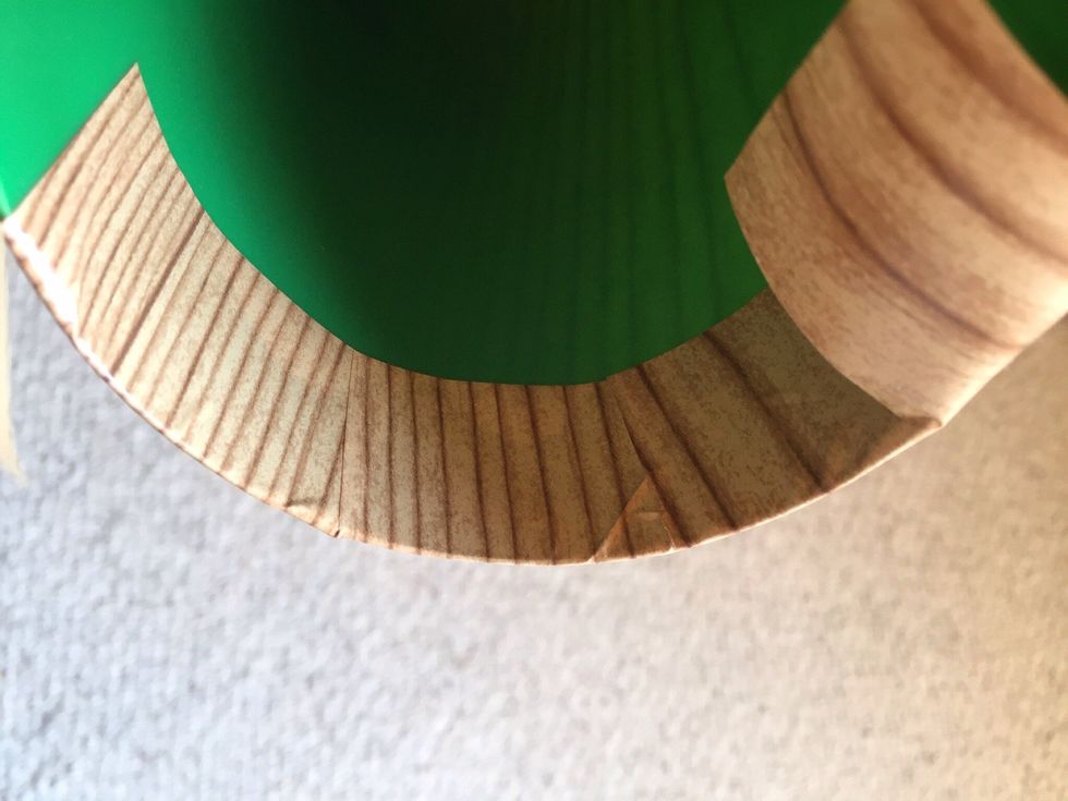 Fold pieces tightly down along cups rim.