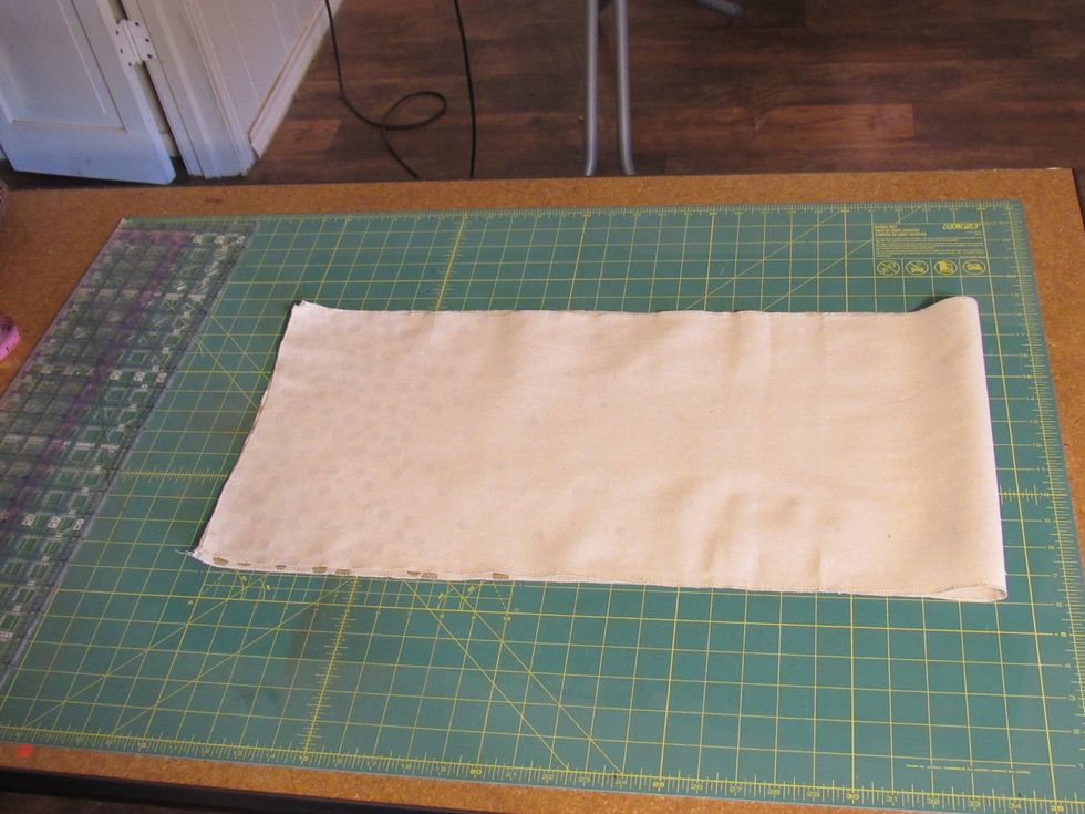Fold pressed table runner in half.