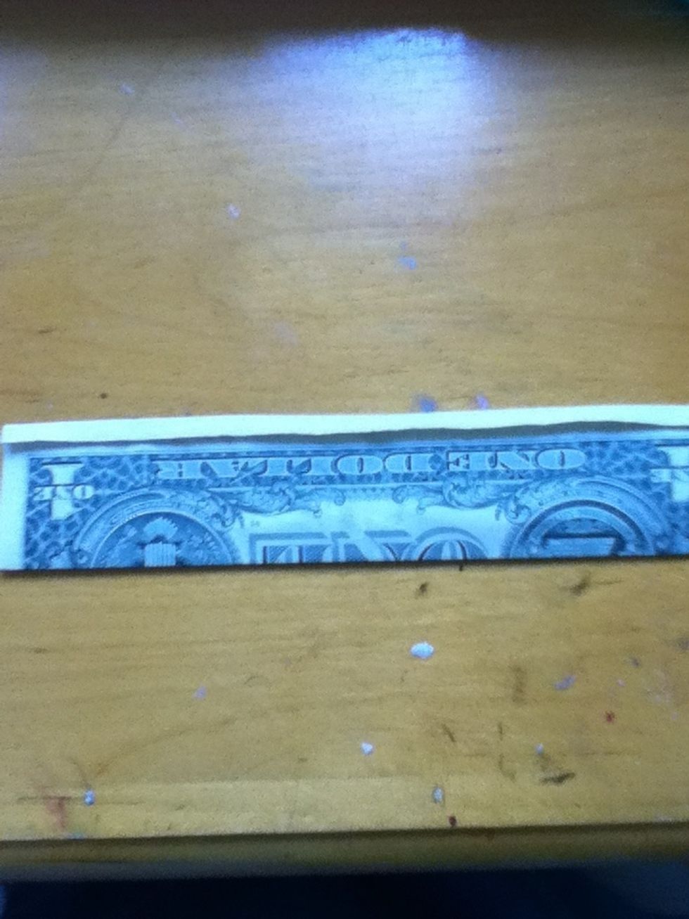 Fold rhe bottom up and tuck it under the flap.