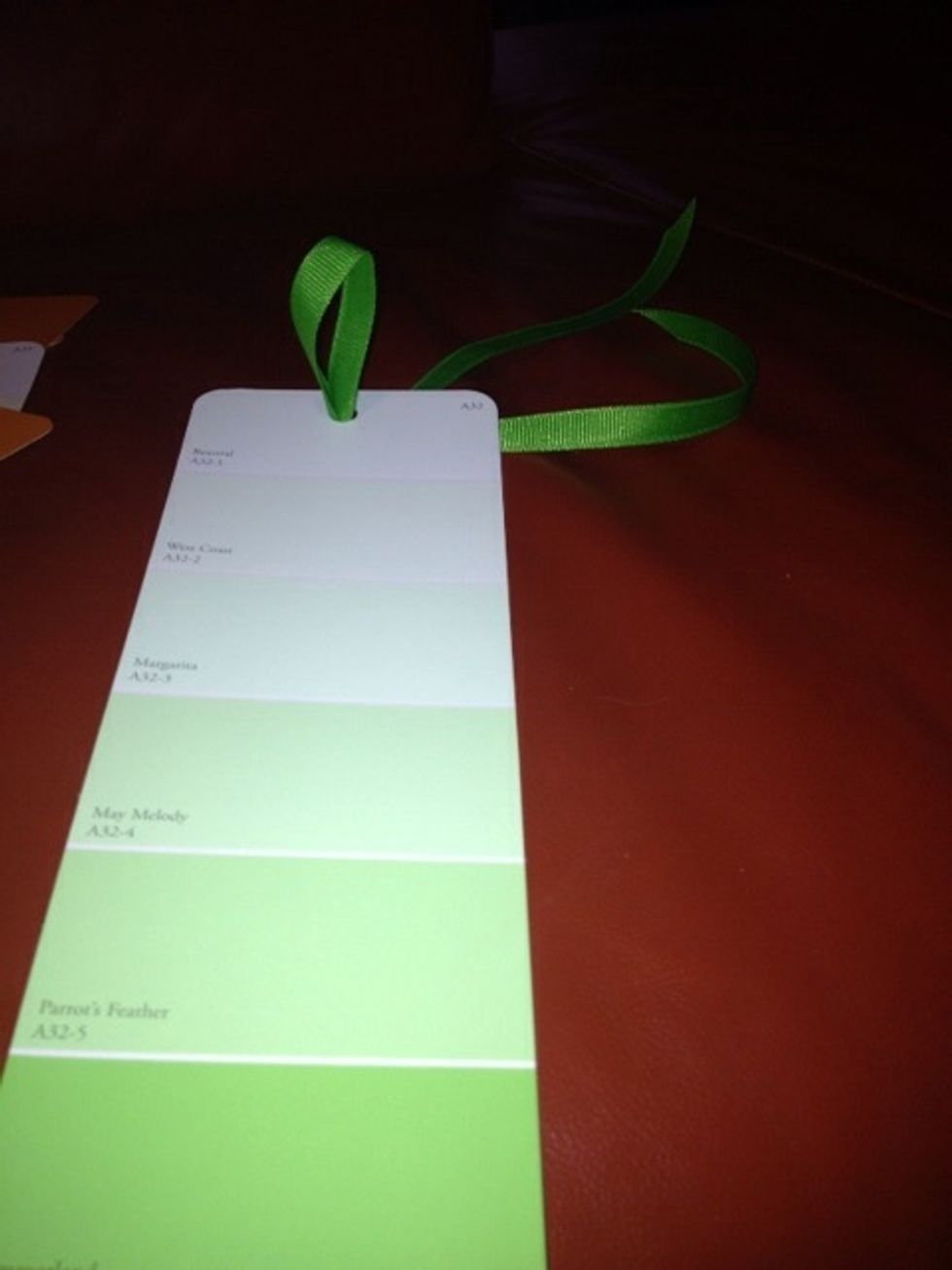 Fold ribbon in half, and thread doubled ribbon through hole in chip.