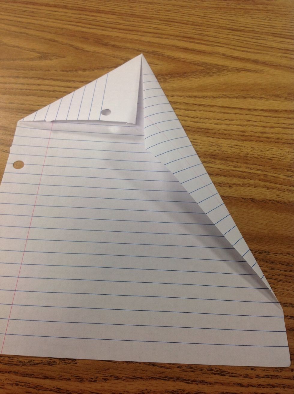 Fold right corner again to the center