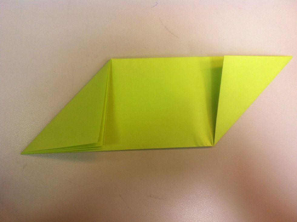 Fold right corner up.
