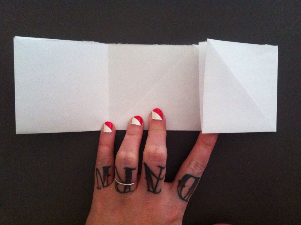 Fold right edge to center crease.