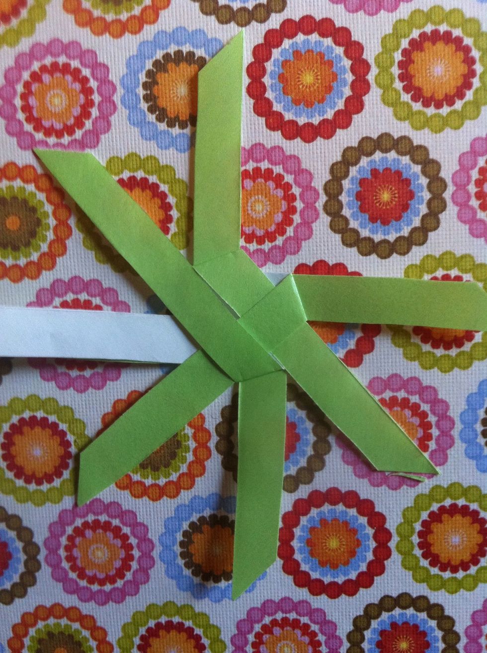 Fold right over & under diagonally.