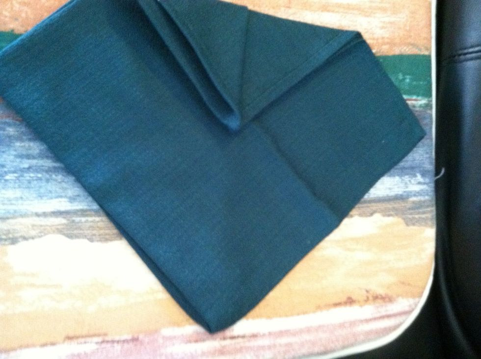 Fold side corner into center