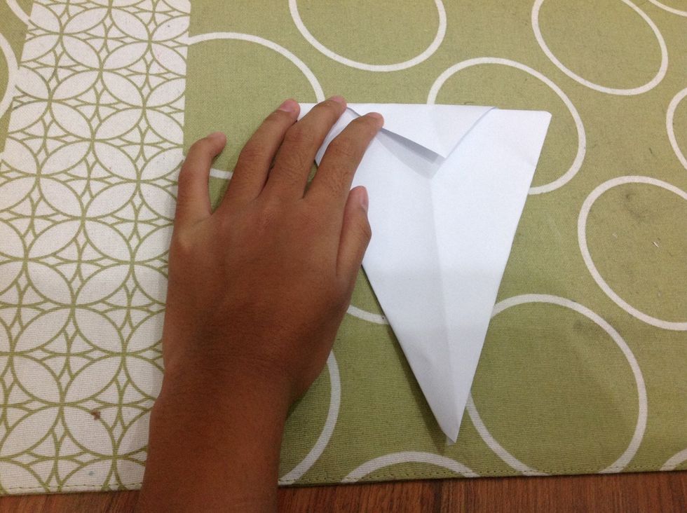 Fold that triangle down again