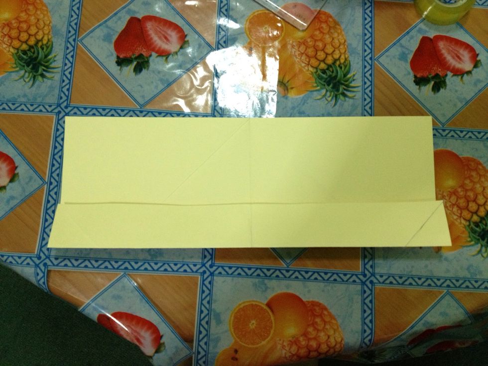 Fold that \ud83d\udc46 part of the paper to the middle crease.