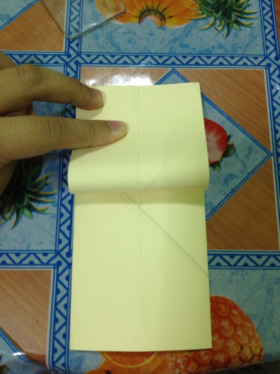 Fold that \ud83d\udc46part of the paper upwards. And do the same with the other side. Then open it up again.