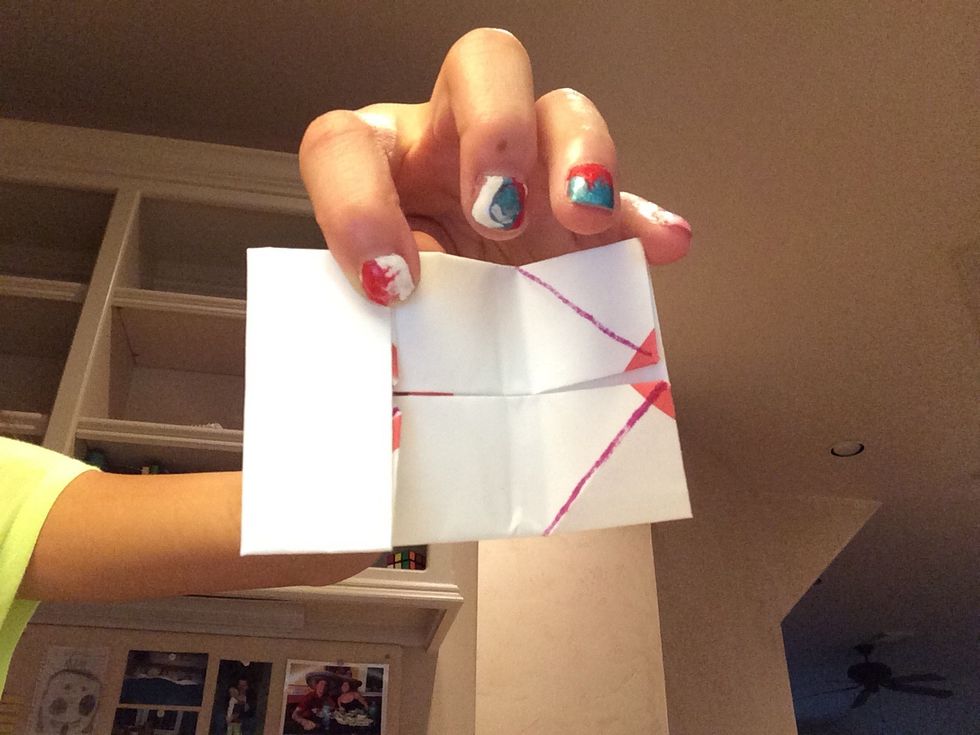 Fold the 2 shorter sides to the center