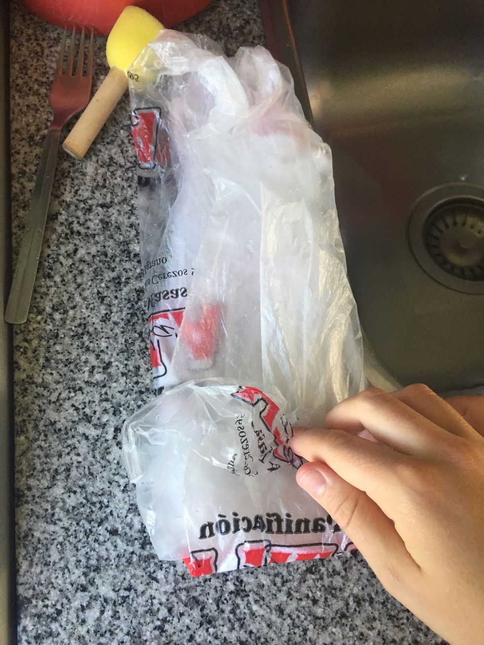 Fold the bag so a part is left without folds (to place over aching part) and the other is just plastic folded