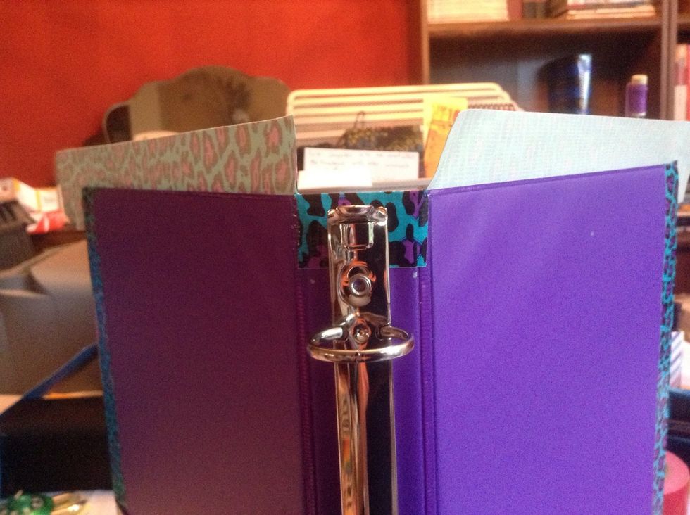 Fold the binding part down as far towards the post as you can. Press down.