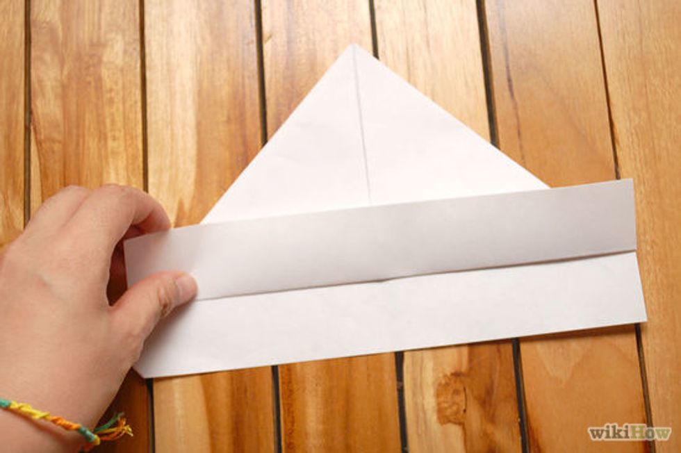 Fold the bottom and do the same on the back.