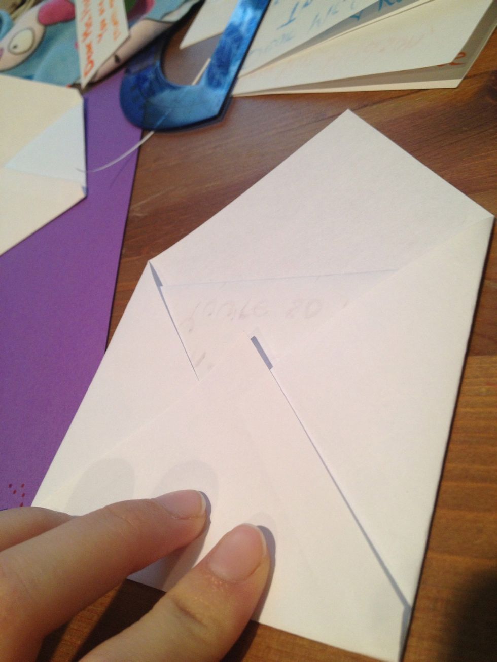 Fold the bottom corner up.