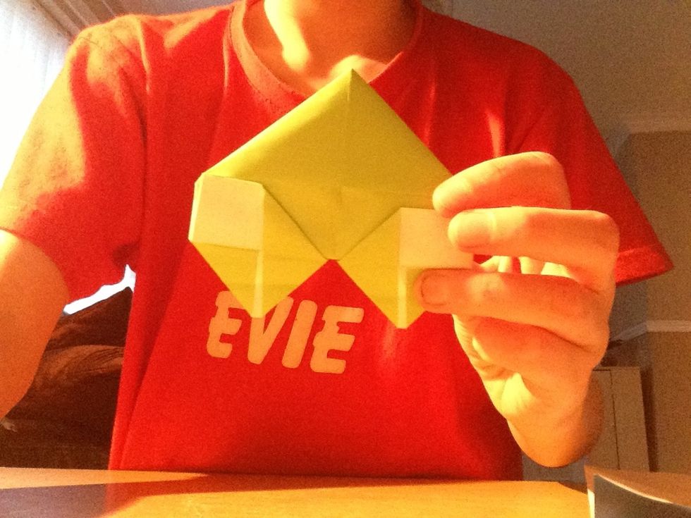 Fold the bottom corners inwards