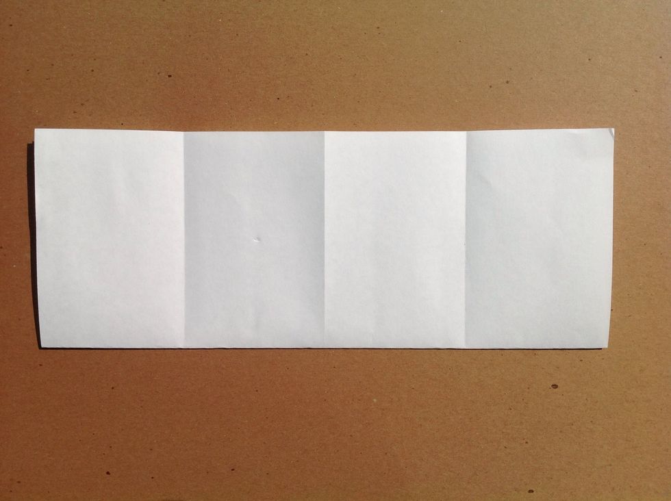 Fold the bottom edge to the top edge.