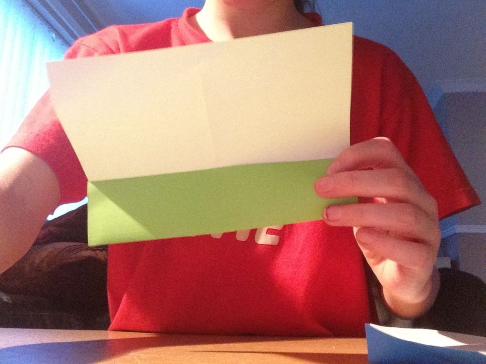 Fold the bottom into the middle crease of the paper