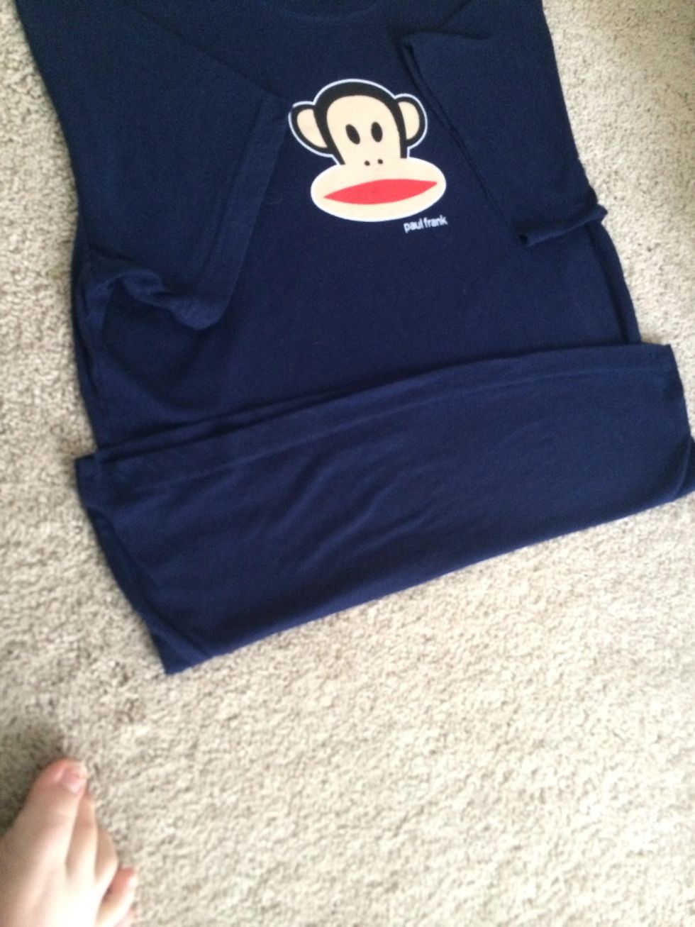 Fold the bottom part of the shirt up. Ignore my foot again. (You get the point with the wrinkles)