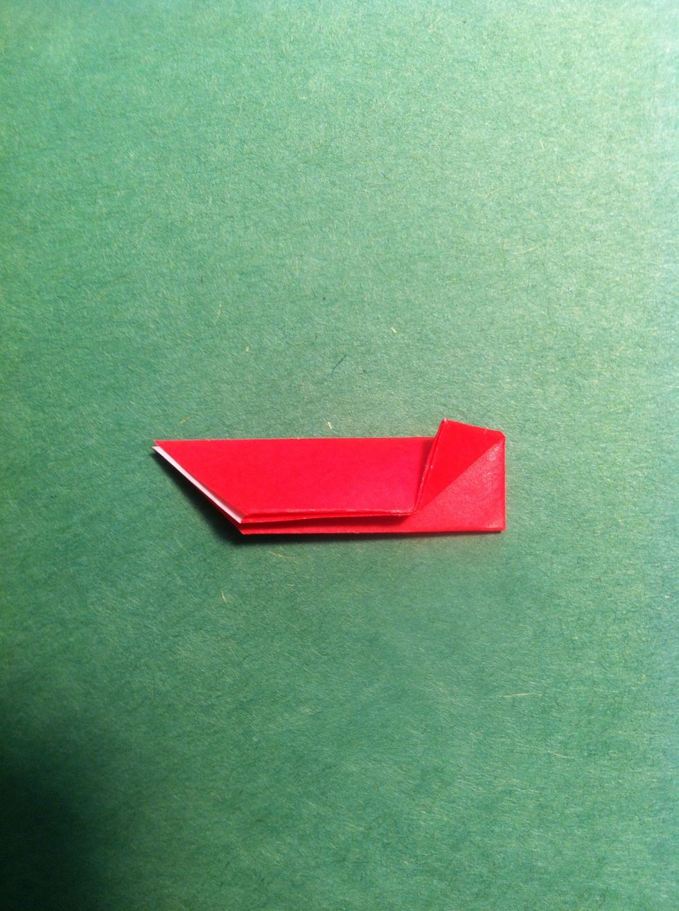 Fold the bottom right corner up (top layer).