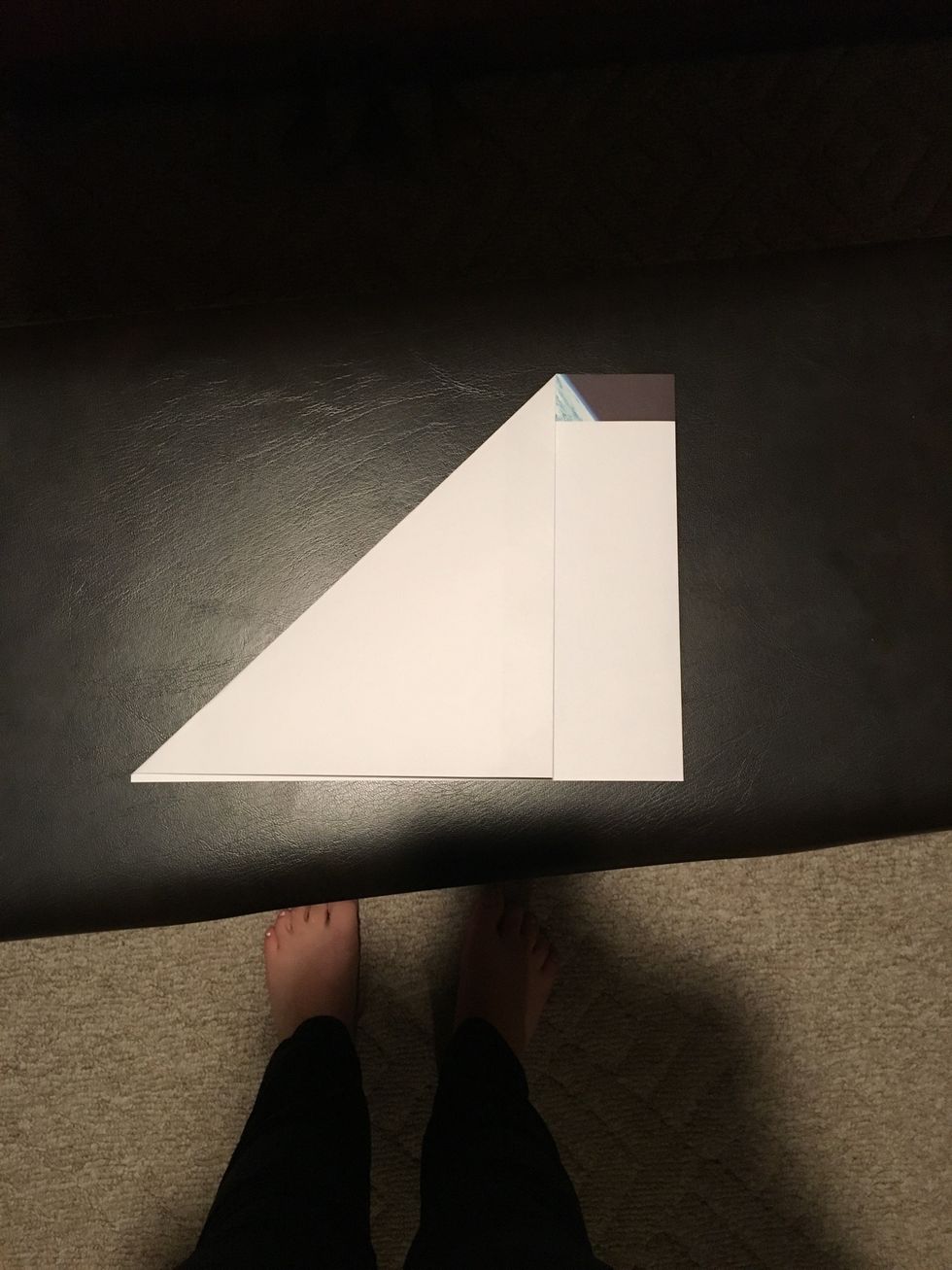 Fold the corner in to make a square