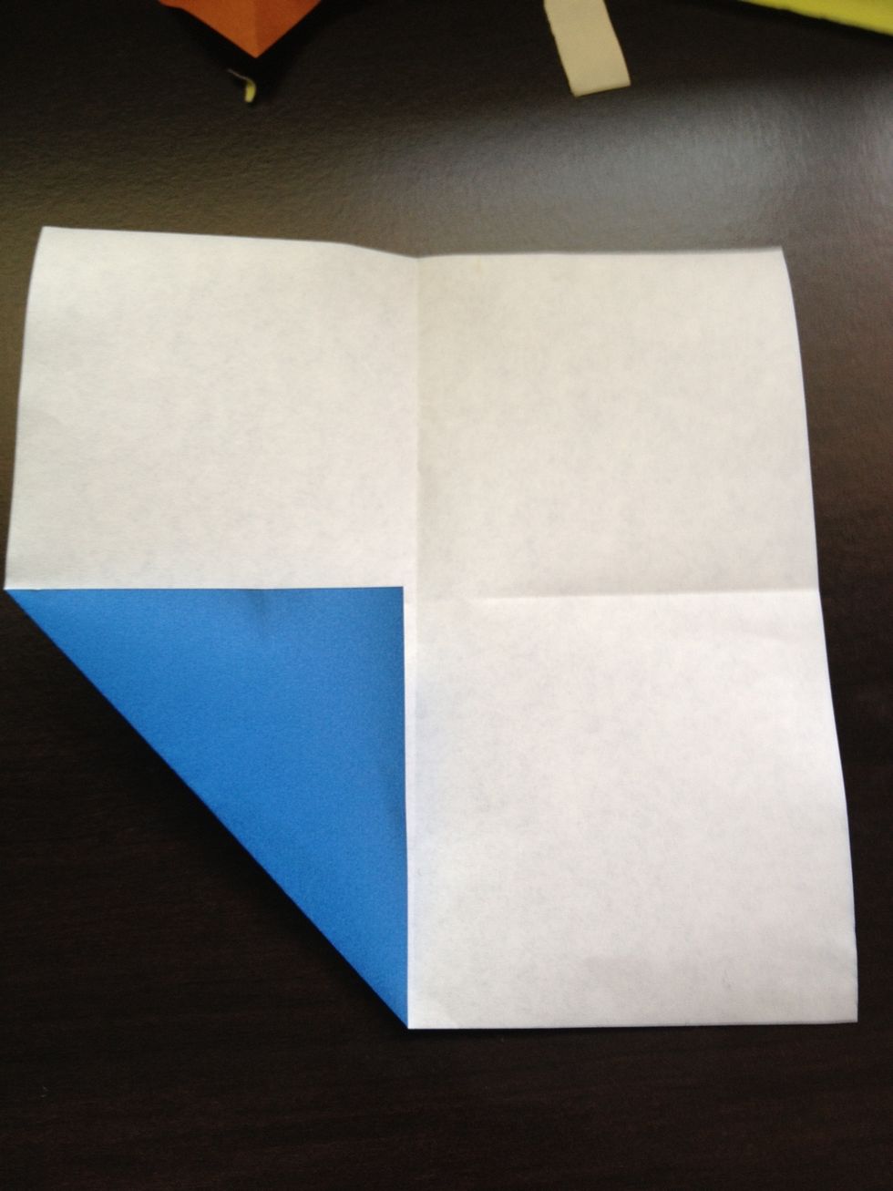 Fold the corner into the middle.
