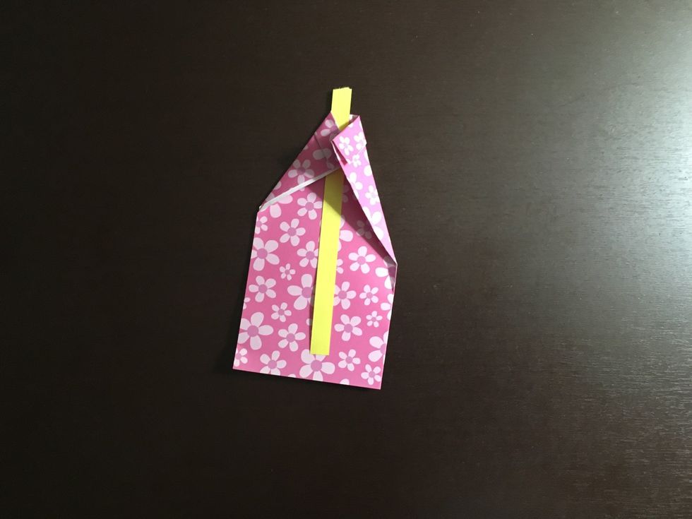 Fold the corner on top of the star paper