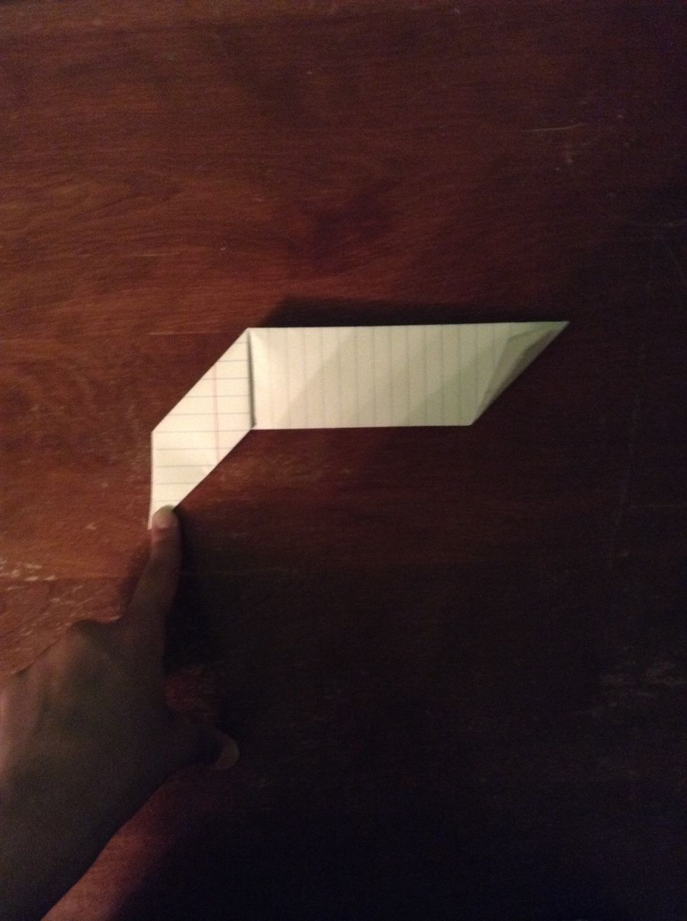 Fold the corners again