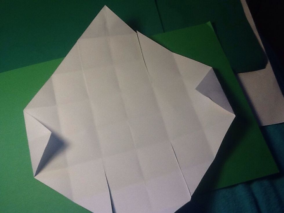 Fold the corners down to the first line again