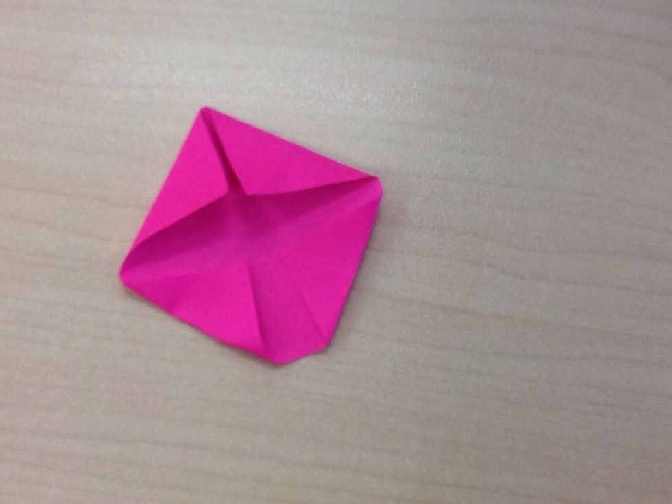 Fold the corners in. It should now look like this.