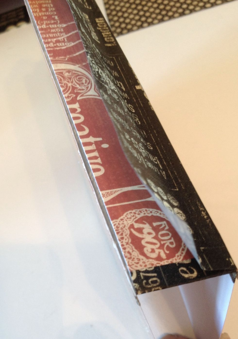 Fold the cover and glue washi tape on the outside.