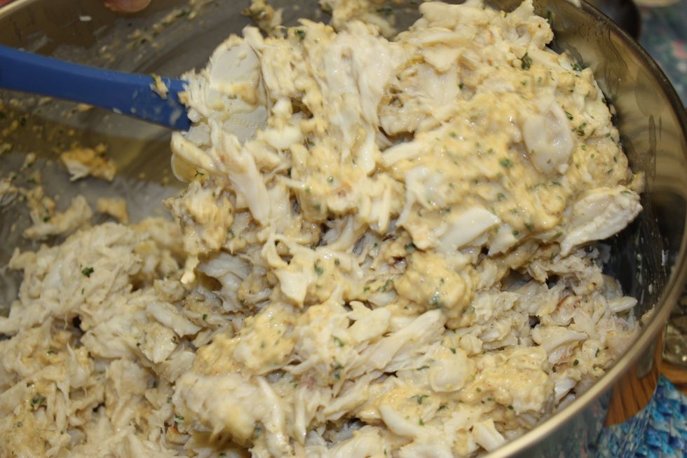 Fold the crab into the mixture. Again, do not try to 'mix it'. That will break up the crab and you will lose the textures.