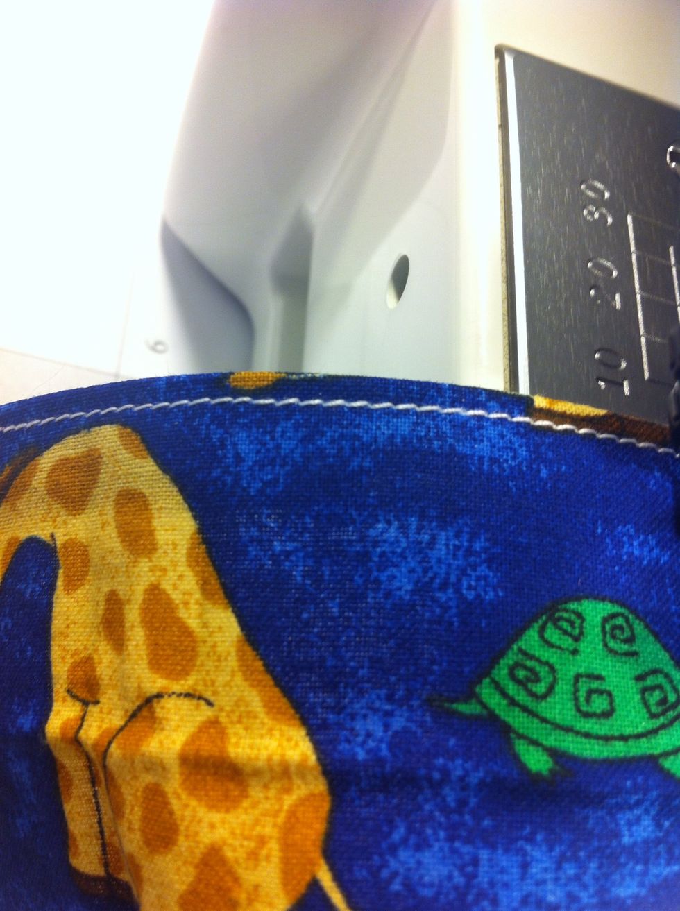 Fold the cut piece over and sew along the line. This will help the fabric match the shoe a little better.