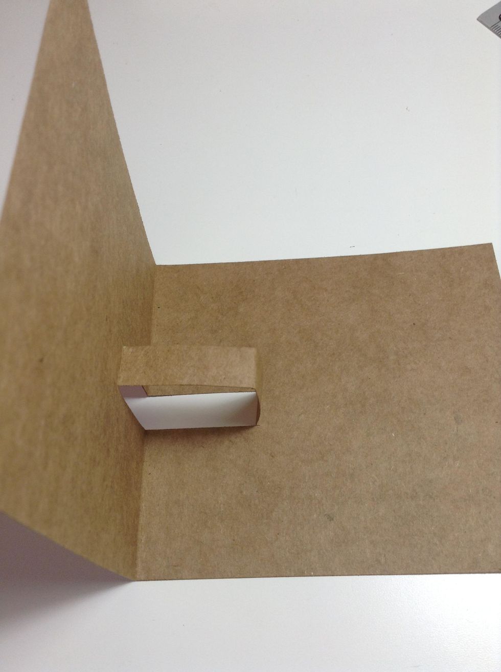 Fold the cut steps on the horizontal line between the cut lines. Unfold.