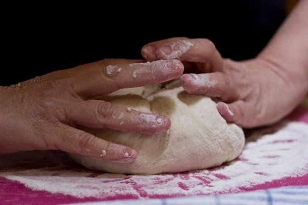 Fold the dough over into a four corner package shape.