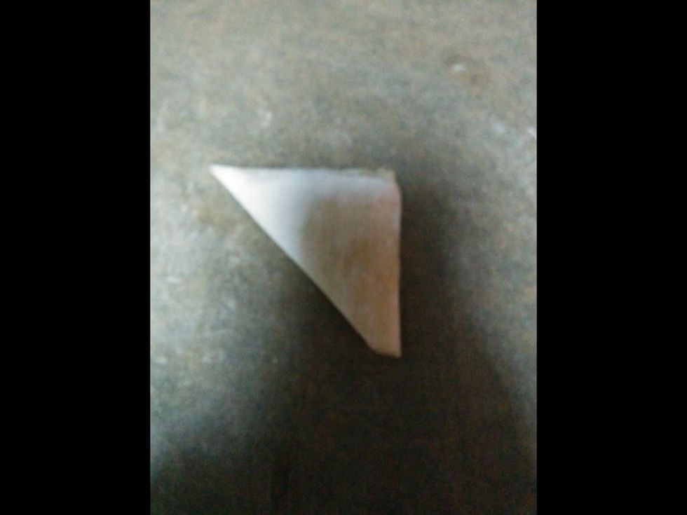 Fold the dough up into a triangle