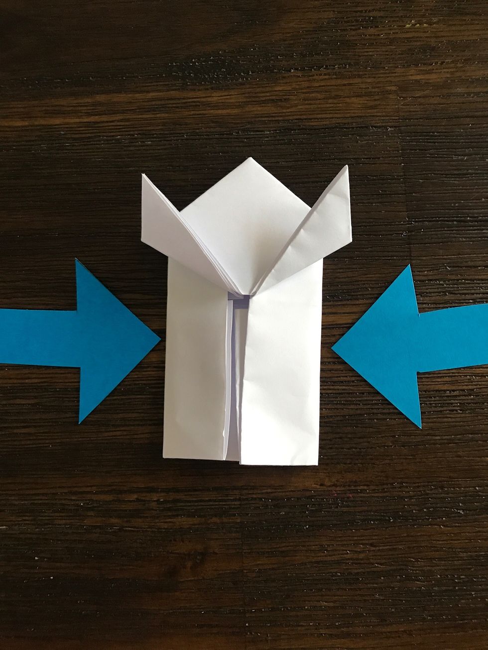 Fold the edges of the rectangle in.