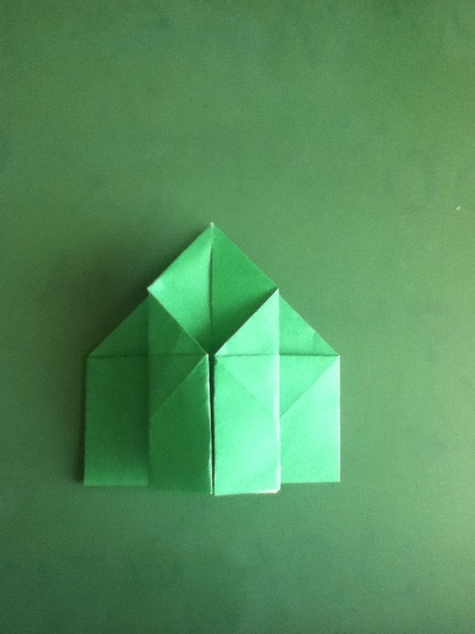 Fold the edges of the upper layer into the center