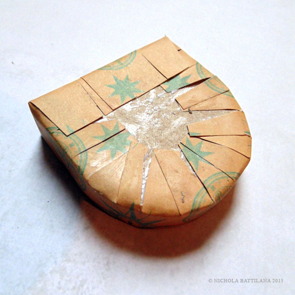 Fold the edges over and glue into place.