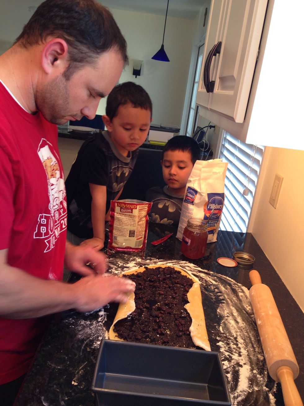 Fold the edges over so it fits in the pan.