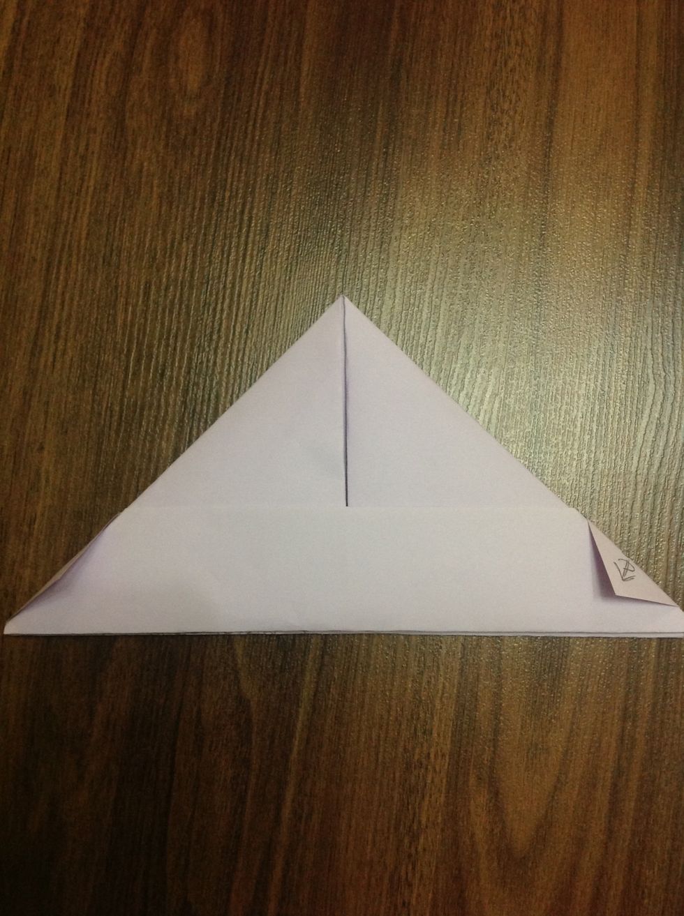 Fold the edges so it looks like a complete triangle