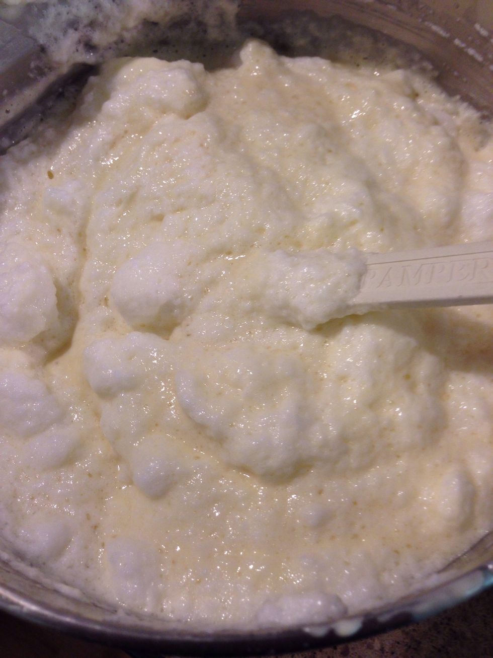 Fold the egg whites into the flour mixture.