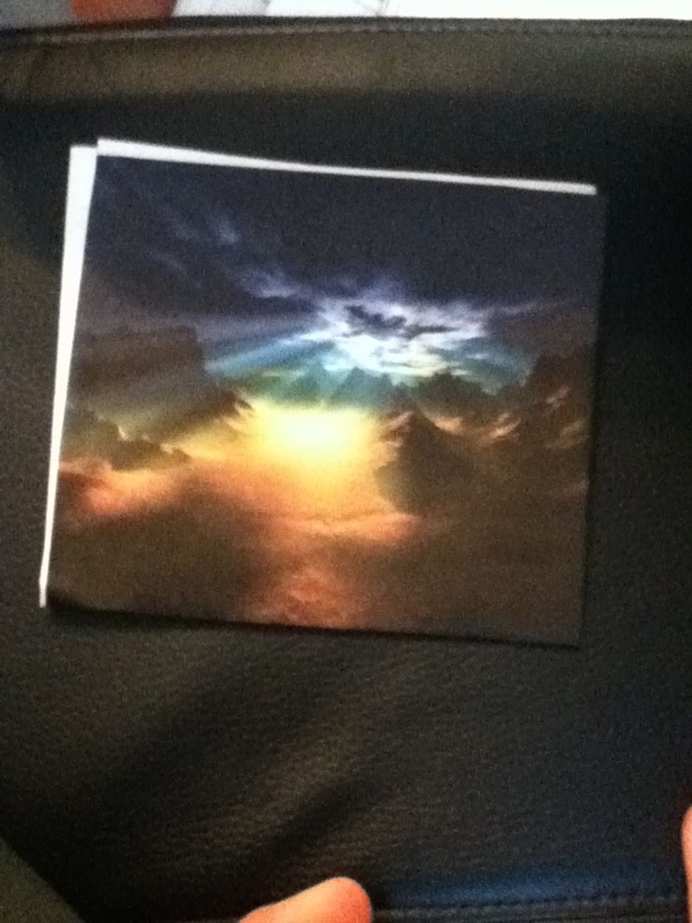 Fold the extra paper back and tape.