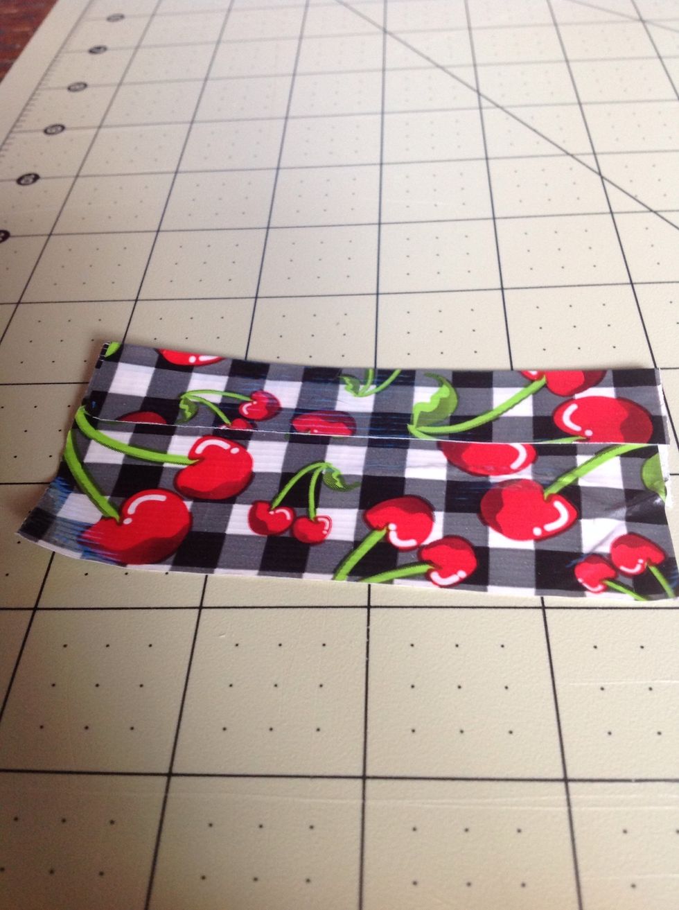 Fold the extra sticky on the top over