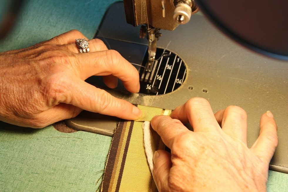 Fold the fabric over the end ......